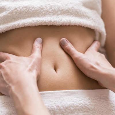 close-up-abdomen-massage-concept_Easy-Resize.com